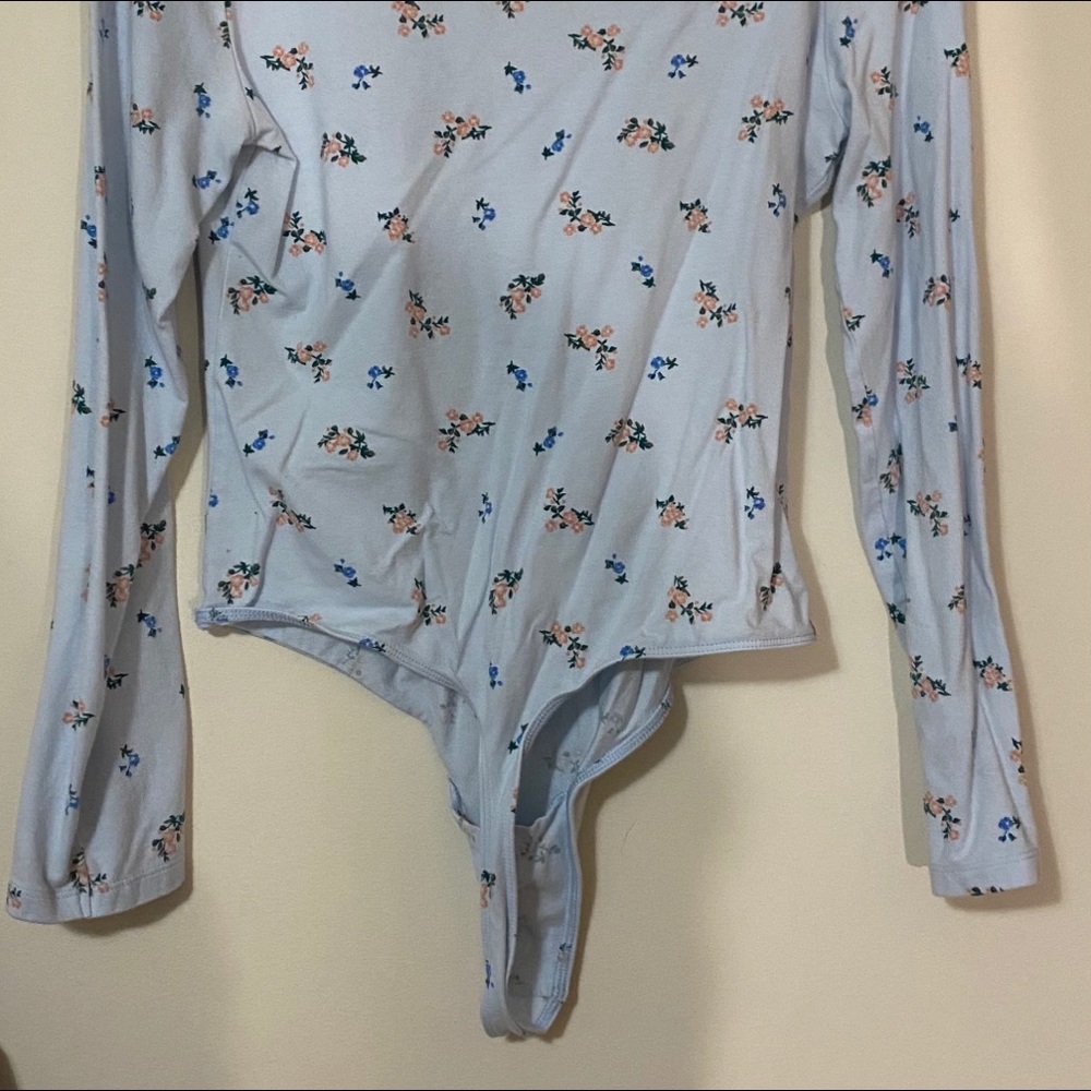 I am selling this P.I.N.K long sleeve one piece.